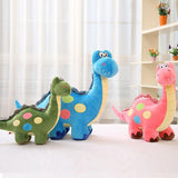 Dinosaure peluche vert rose bleu